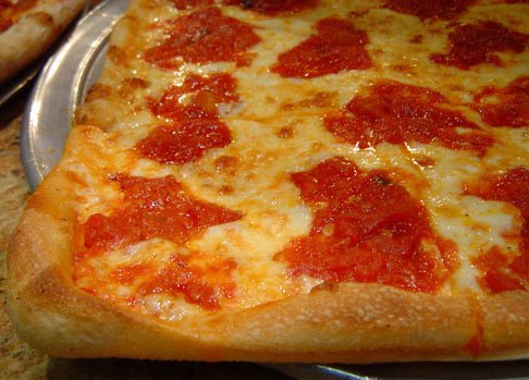 Chicken Parmigiana, breaded chicken with marinara and melted mozzarella